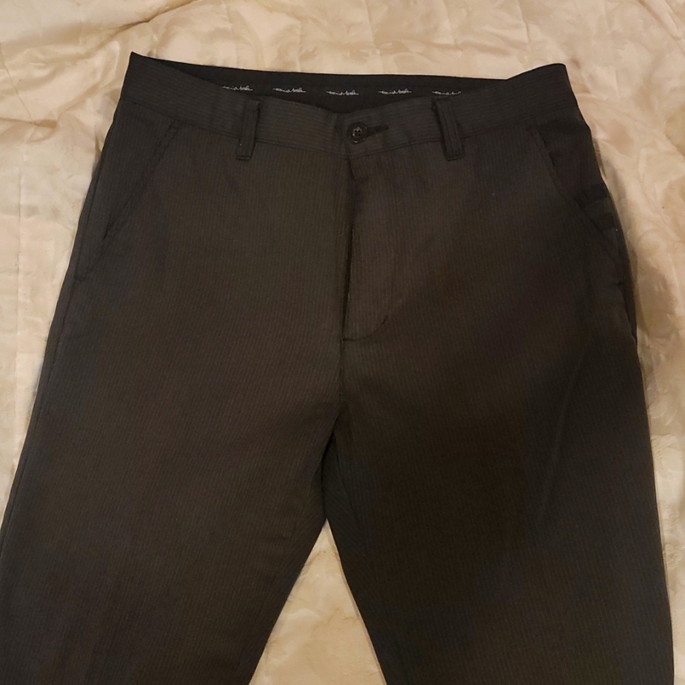 Men's Travis Mathew Pinstripes Grey Golf Pants with notched bottoms.